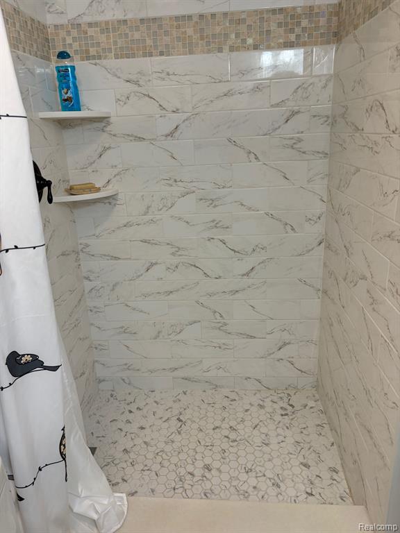 867 SPIREA, Unit #89, Howell, MI 48843 — Photo 15