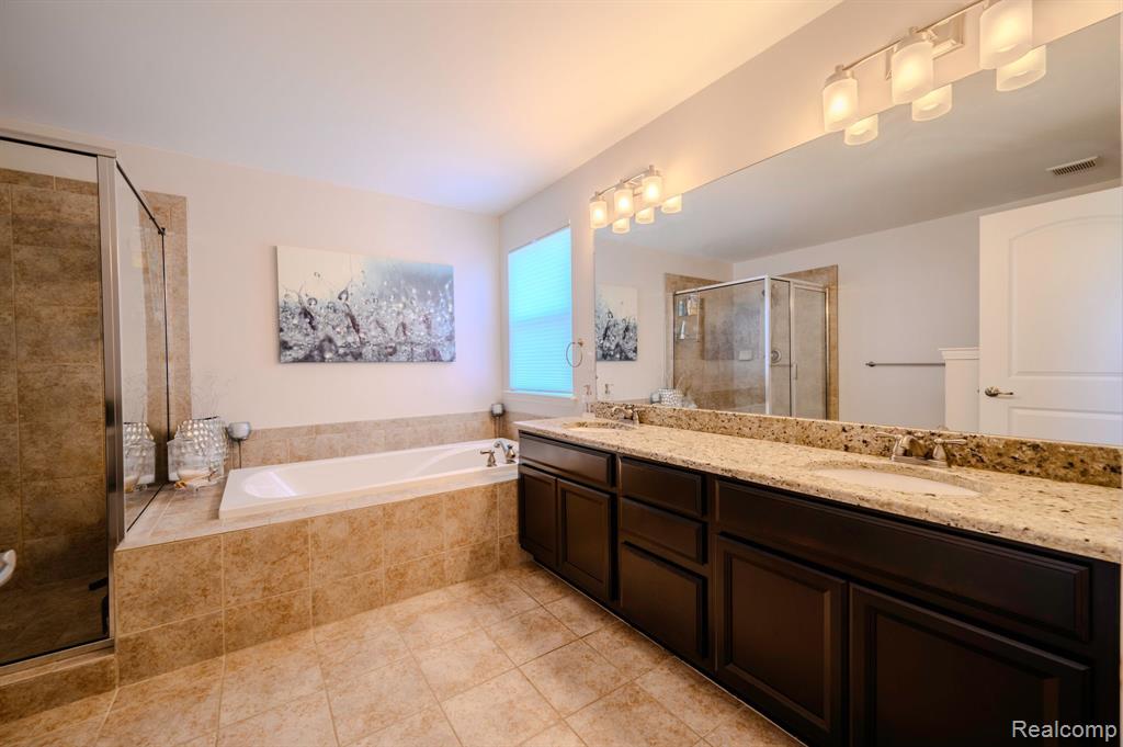 551 HUDSON Circle, South Lyon, MI 48178 — Photo 16