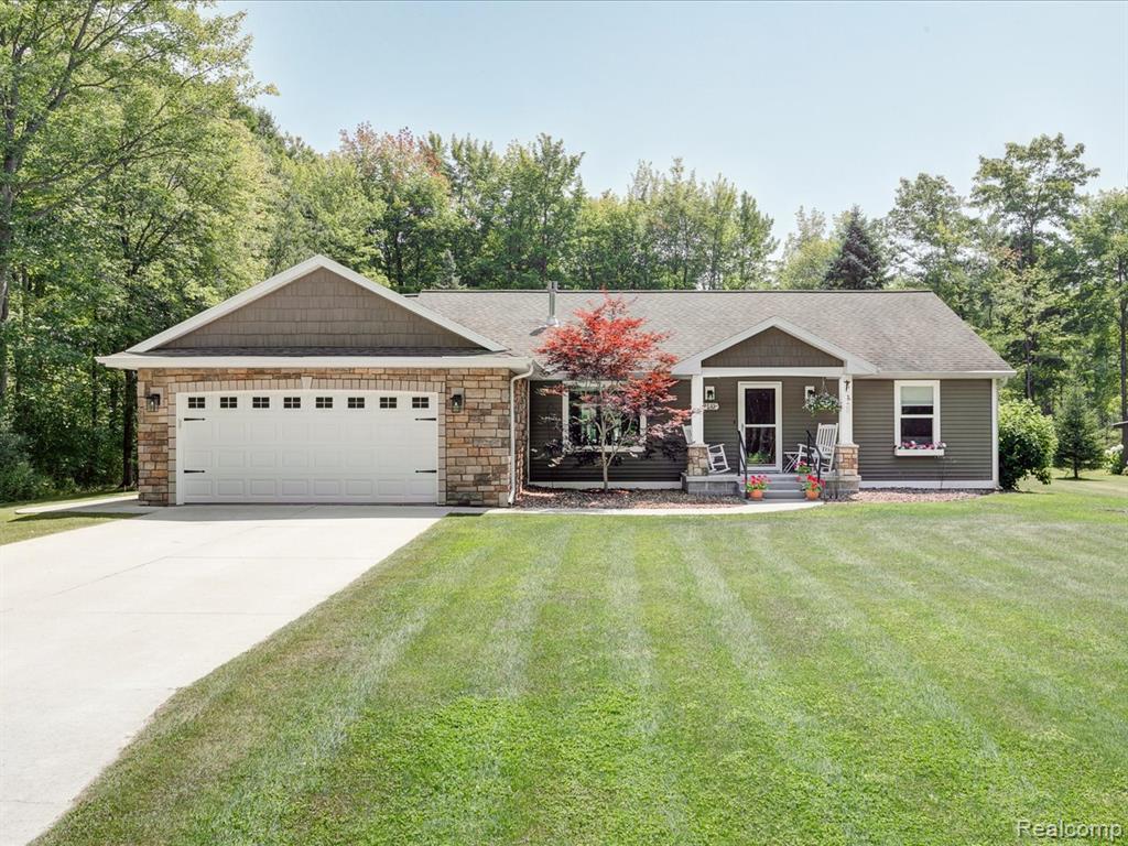 7503 Westwood Drive, Oscoda, MI 48750 — front exterior