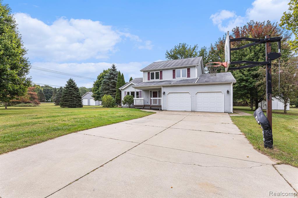 4511 Mount Morris Road, Columbiaville, MI 48421 — front exterior