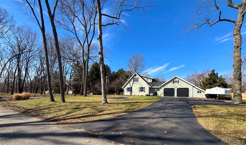 11834 Eriksen Drive, Pinckney, MI 48169 — front exterior