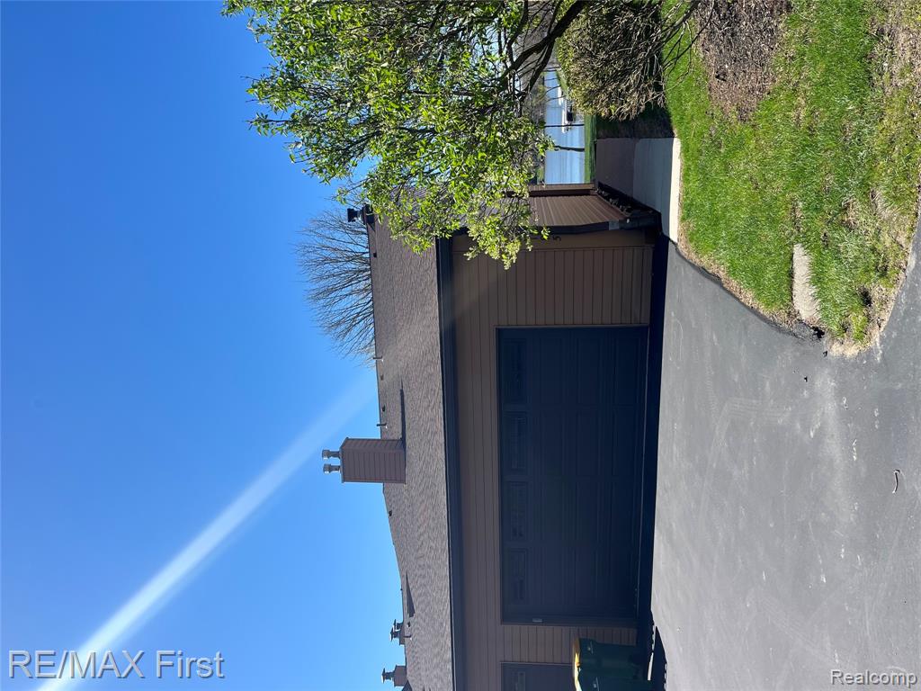 48195 Bayshore Drive, Belleville, MI 48111 — front exterior