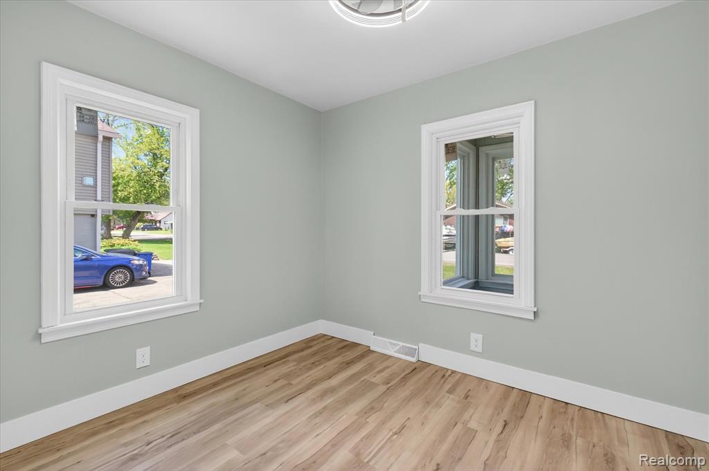 677 Lucille Drive, Wolverine Lake, MI 48390 — Photo 22