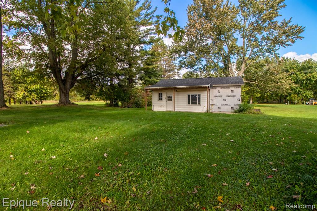 5831 Reed Street, MI 48729 — front exterior
