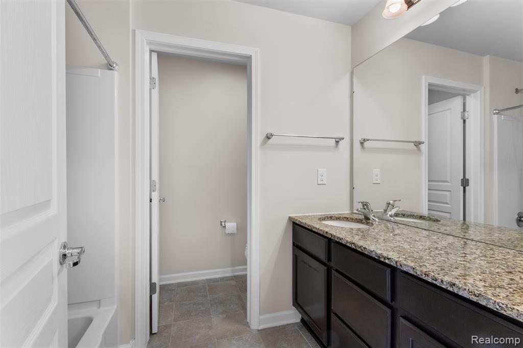 57570 Village Drive, New Hudson, MI 48165 — Photo 34