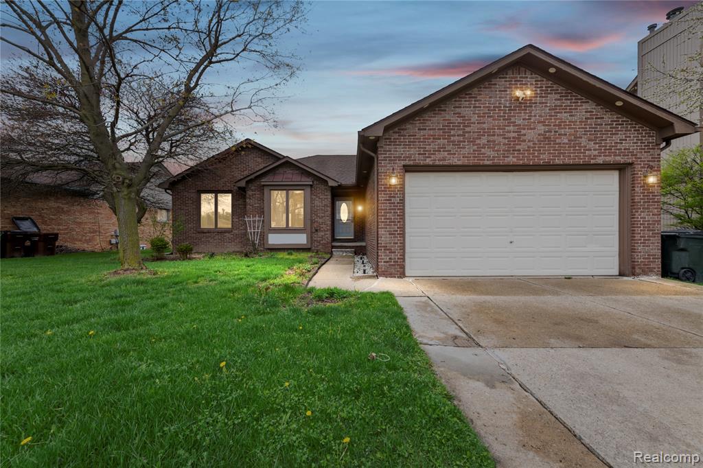 46902 Amberwood Drive, Shelby Twp, MI 48317 — front exterior