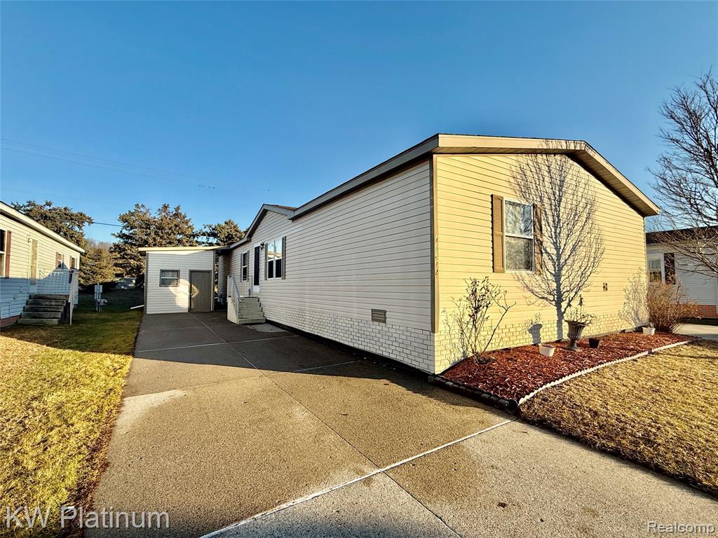 49872 Teton Pass, Shelby Twp, MI 48315 — front exterior