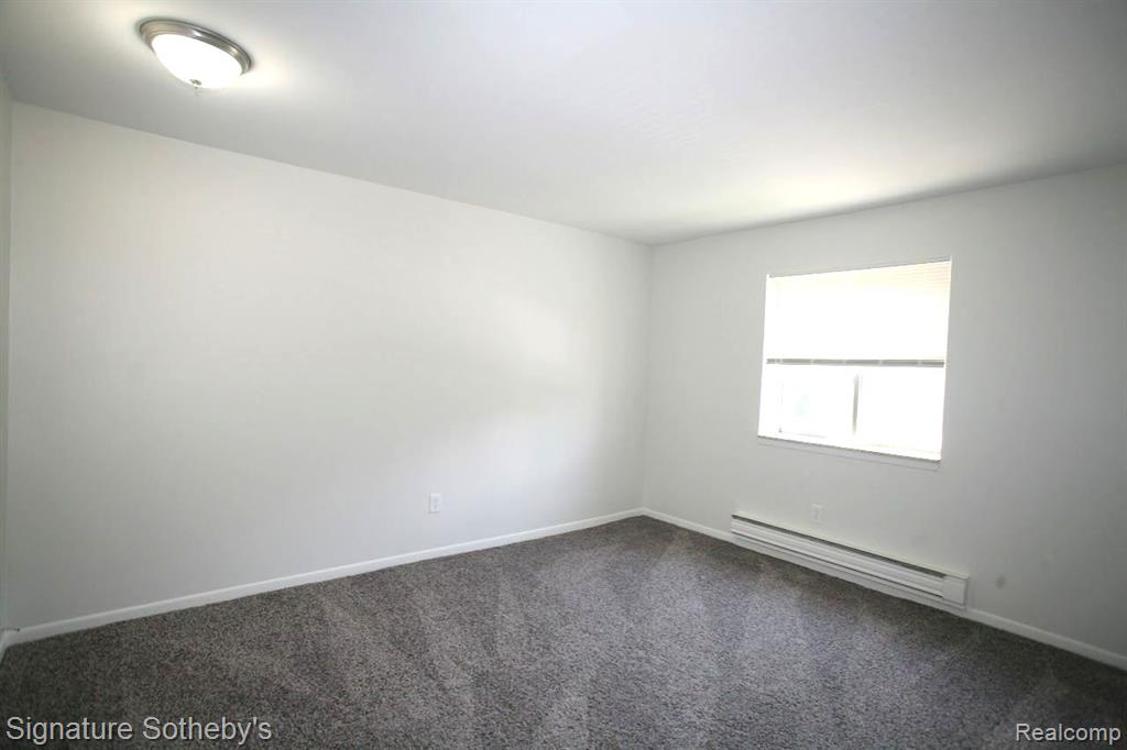 1812 COLONIAL VILLAGE Way, 3, Waterford, MI 48328 — Photo 11
