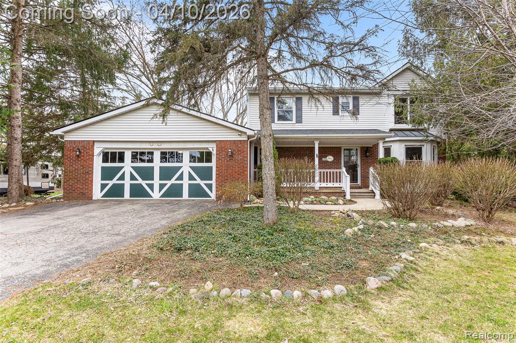 6374 Rickett Road, Brighton, MI 48116 — front exterior