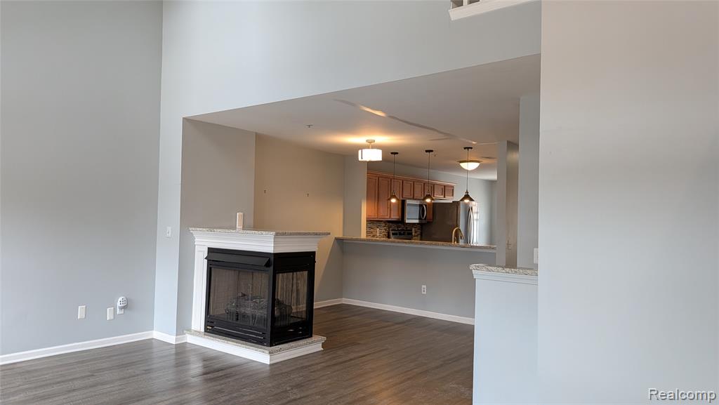 413 VILLAGE Drive, Walled Lake, MI 48390 — Photo 19