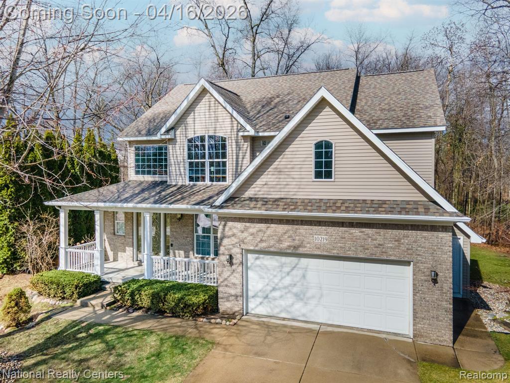 10219 Mill Pointe Drive, Goodrich Vlg, MI — front exterior