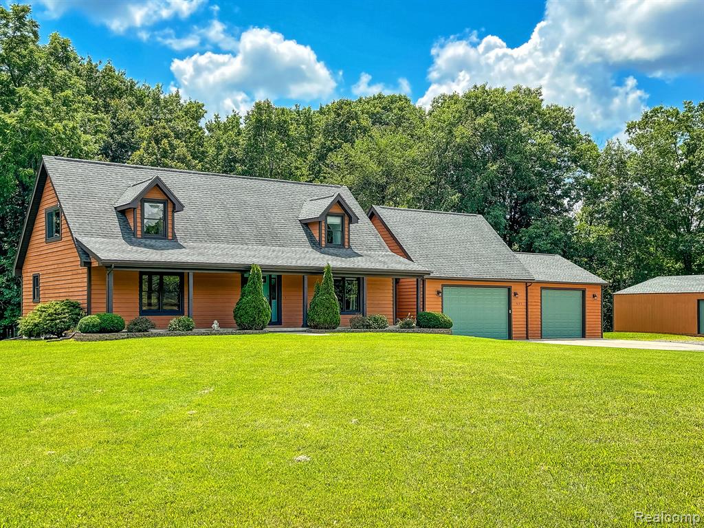 7653 CHASE LAKE Road, Fowlerville, MI 48836 — front exterior