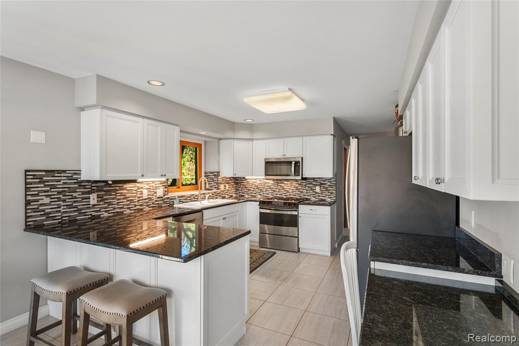 990 Brewer Road, Leonard, MI 48367 — Photo 14