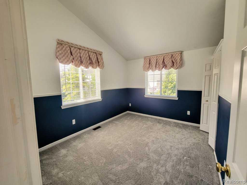 124 Champlain Boulevard, Howell, MI 48843 — Photo 28