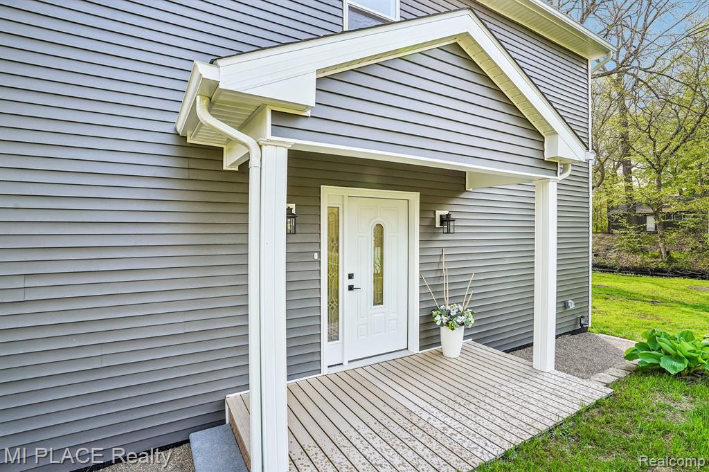 9755 Portage Trail, White Lake, MI — front exterior