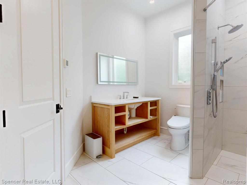 571 Dunleavy Drive, Highland, MI 48356 — Photo 16