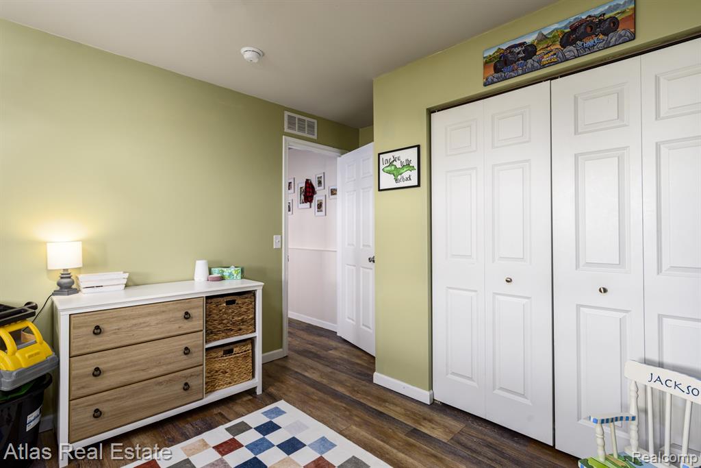 8582 Pinnebog River Drive, Fowlerville, MI 48836 — Photo 28