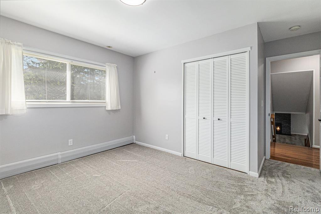 2145 Helmsford Drive, Wolverine Lake, MI 48390 — Photo 32