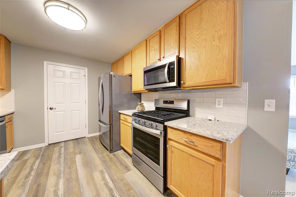 3082 Kneeland Circle, Howell, MI 48843 — Photo 17