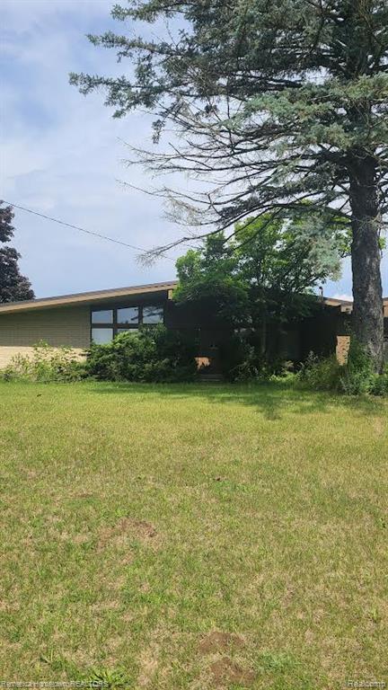 60001 Grand River Avenue, New Hudson, MI 48165 — front exterior