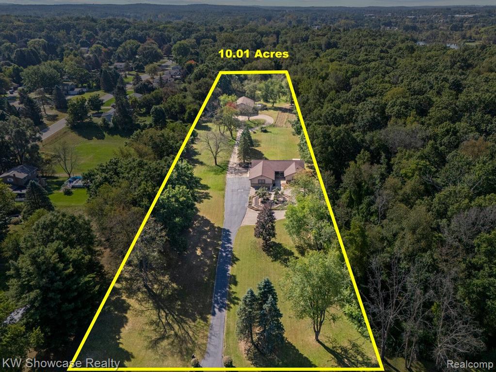 766 WHITE HOUSE Drive, Highland, MI 48356 — Photo 9