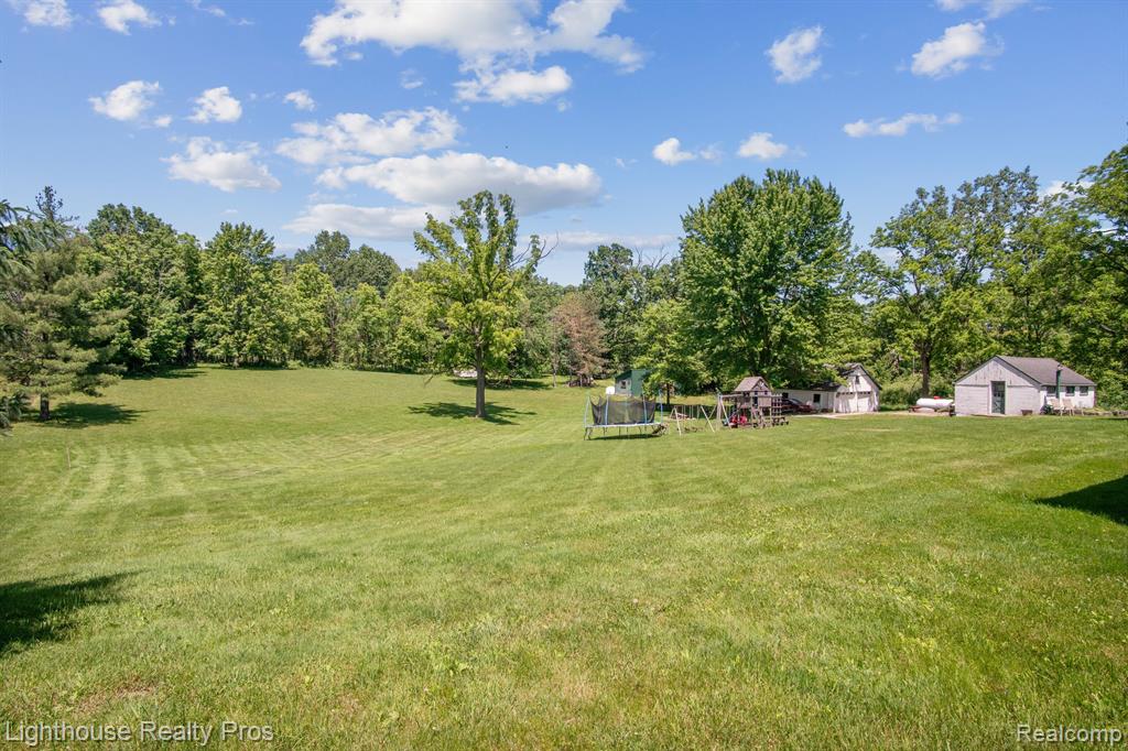 67640 W 8 MILE Road, South Lyon, MI 48178 — Photo 32