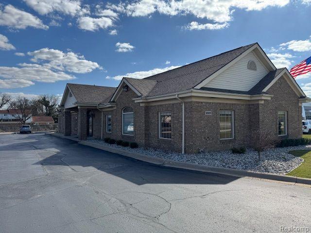 6909 HIGHLAND Road, Waterford, MI 48327 — front exterior