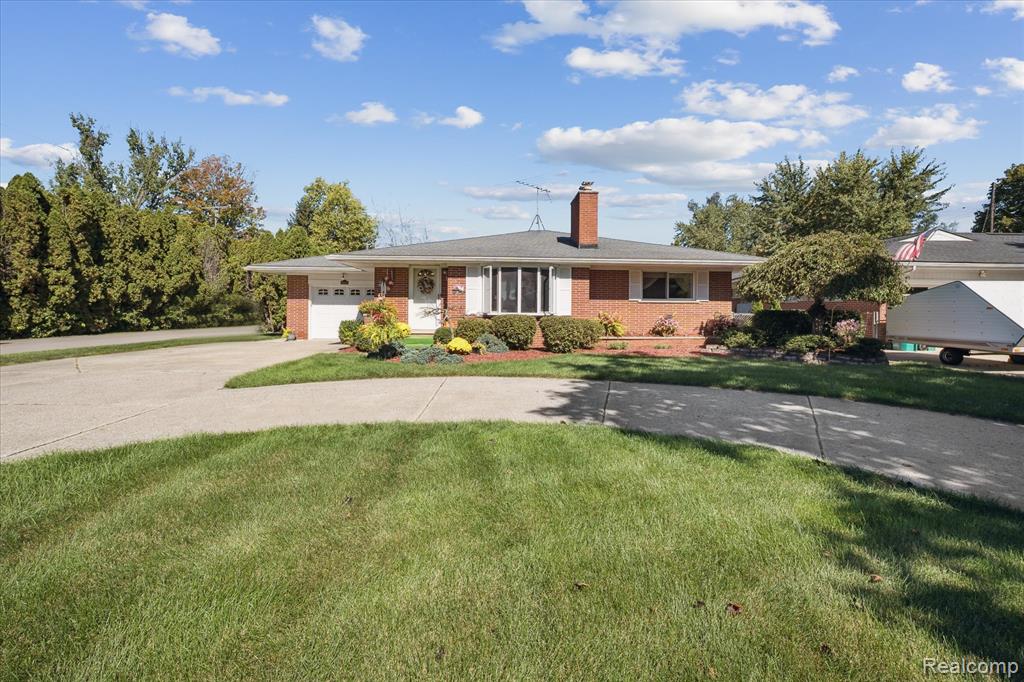 49816 W Huron River Drive, Belleville, MI 48111 — front exterior