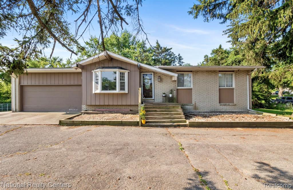 7716 Highland Road, White Lake, MI 48383 — front exterior