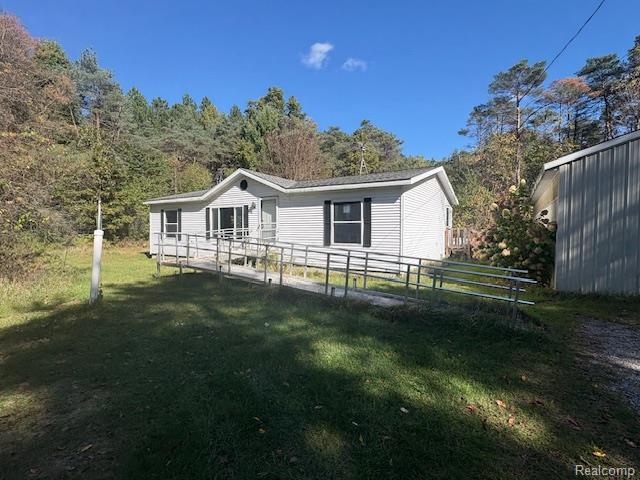 7844 S Beech Avenue, Howard City, MI 49329 — front exterior