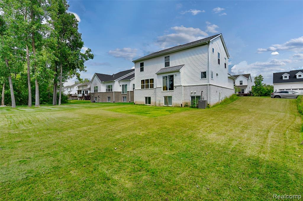 569 Pattan Drive, Wixom, MI 48393 — Photo 41