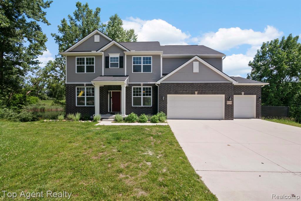 63770 Dequindre Road, Washington, MI 48095 — front exterior