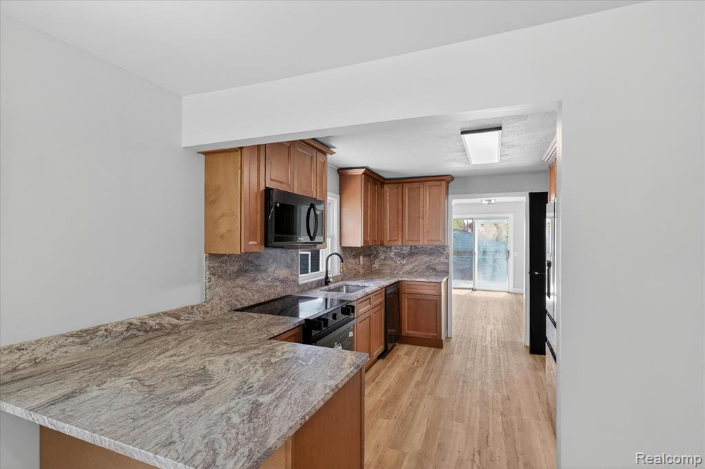 677 Lucille Drive, Wolverine Lake, MI 48390 — Photo 11