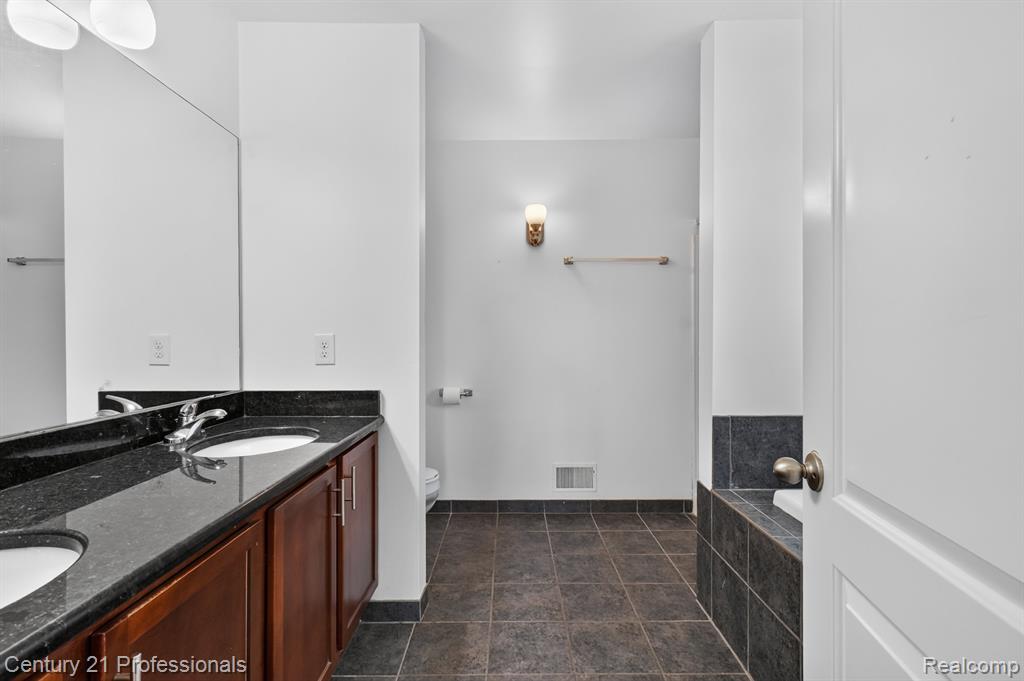 2042 Decker Road, Walled Lake, MI 48390 — Photo 24