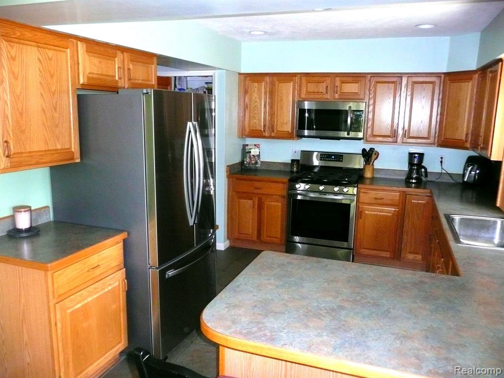 831 DEL SHER Drive, Brighton, MI 48114 — Photo 16