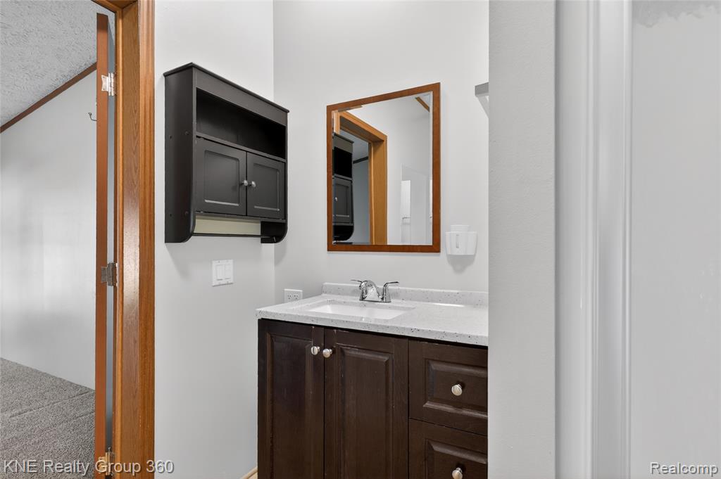 672 Red Oaks Drive, Howell, MI 48843 — Photo 18