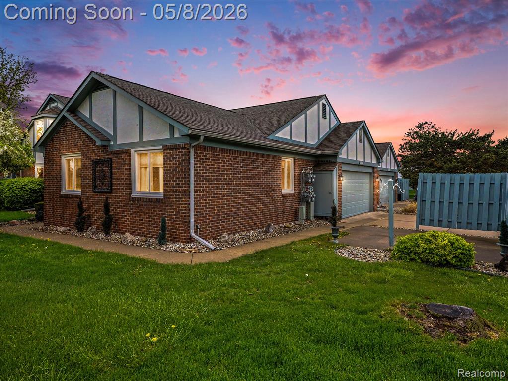 15596 Huntcliff Drive, 40, Macomb, MI 48044 — front exterior