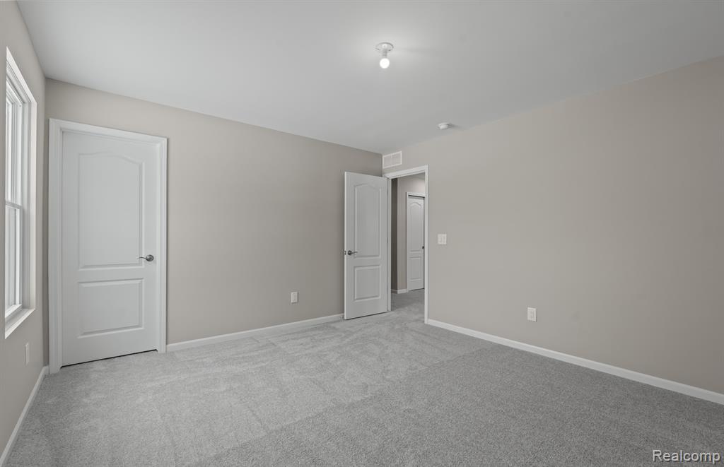 59559 Schuss Gully Drive, New Hudson, MI 48165 — Photo 27