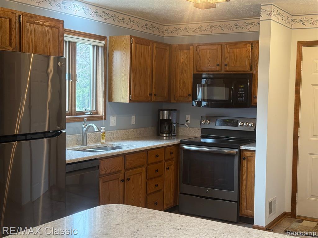 5855 Caleta Drive, Lansing, MI 48911 — Photo 12
