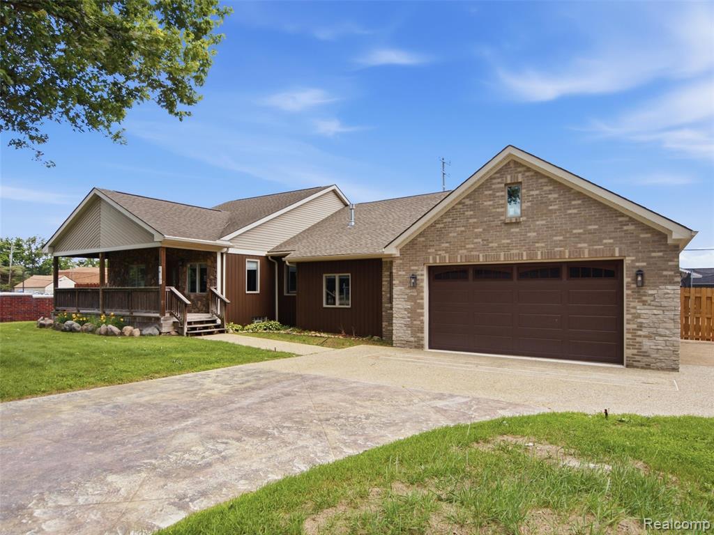 58106 Delmar, Washington, MI — front exterior