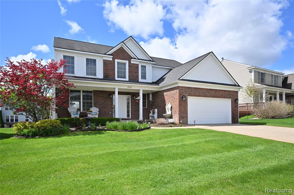 57813 Cider Mill Drive, New Hudson, MI 48165 — front exterior