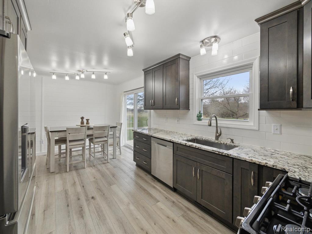 5469 HOGBACK Road, Fowlerville, MI 48836 — Photo 10