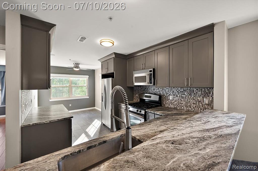 456 Boardwalk Drive, Walled Lake, MI 48390 — Photo 13
