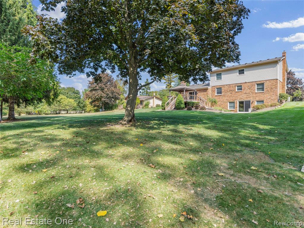 4798 Kenicott Trail, Brighton, MI 48114 — Photo 32