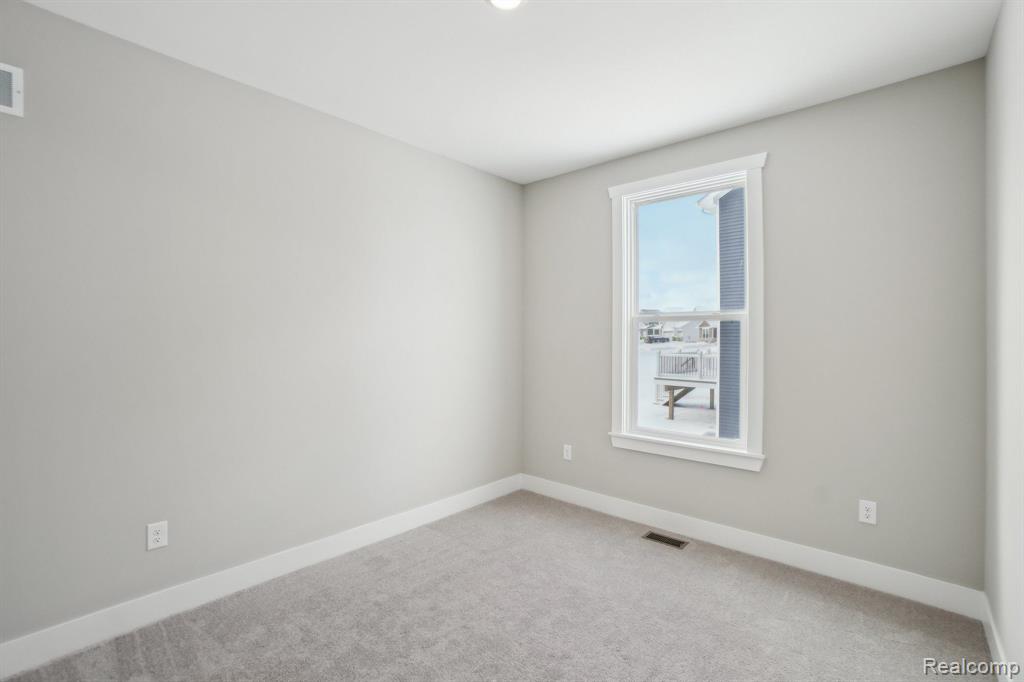 677 Round Rock Dr, Howell, MI 48843 — Photo 17