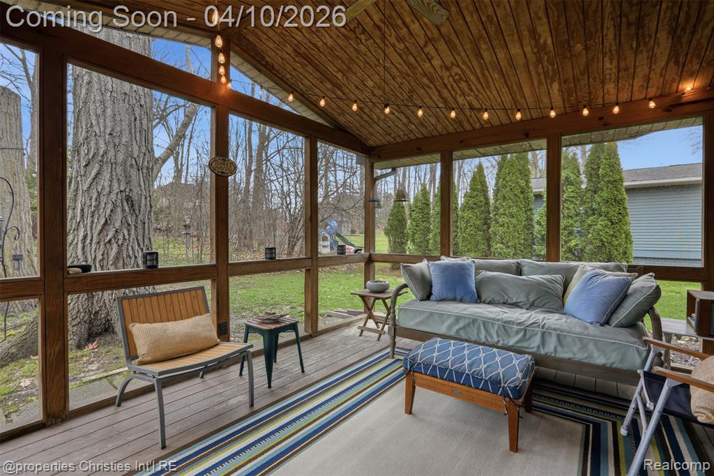 Sunroom overlooking private backyard.