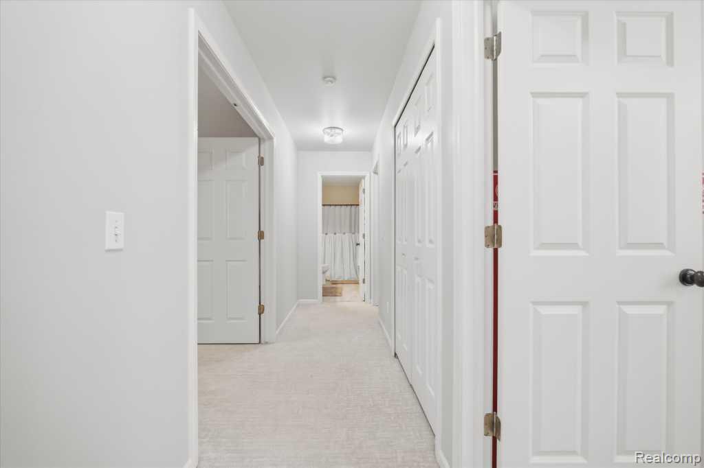 7042 Autumn Wood Drive, Brighton, MI 48116 — Photo 16