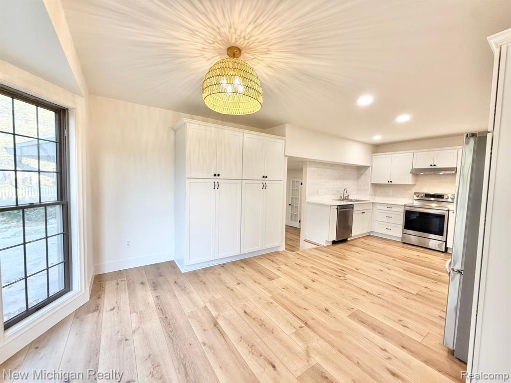 9080 SADDLE HORN Drive, Flushing, MI 48433 — Photo 16