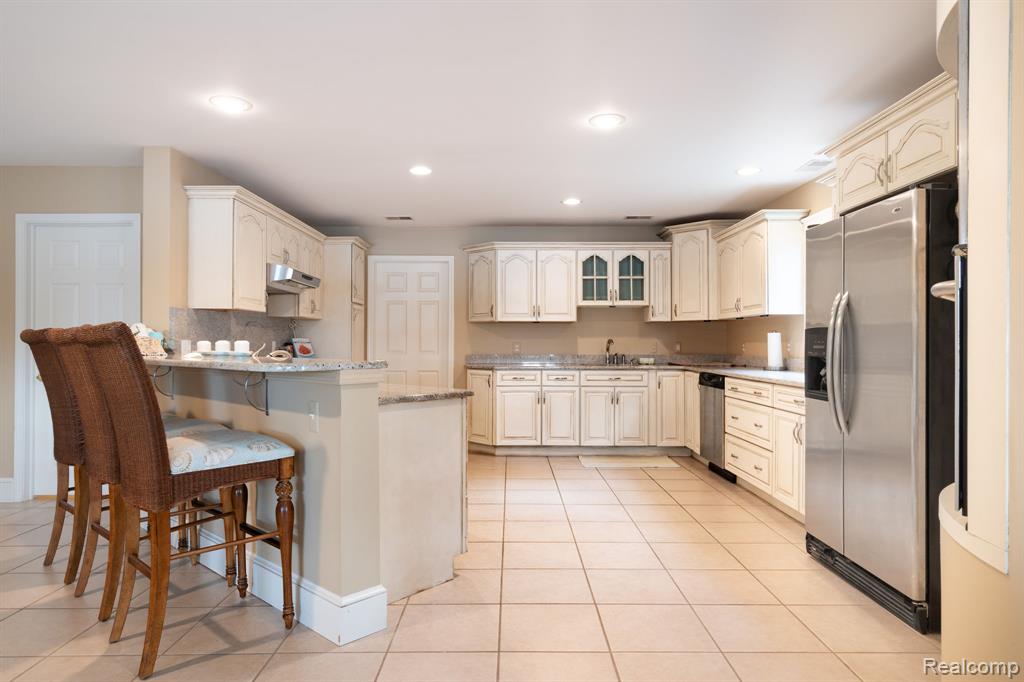 3831 Woodland Drive, Highland, MI 48356 — Photo 13