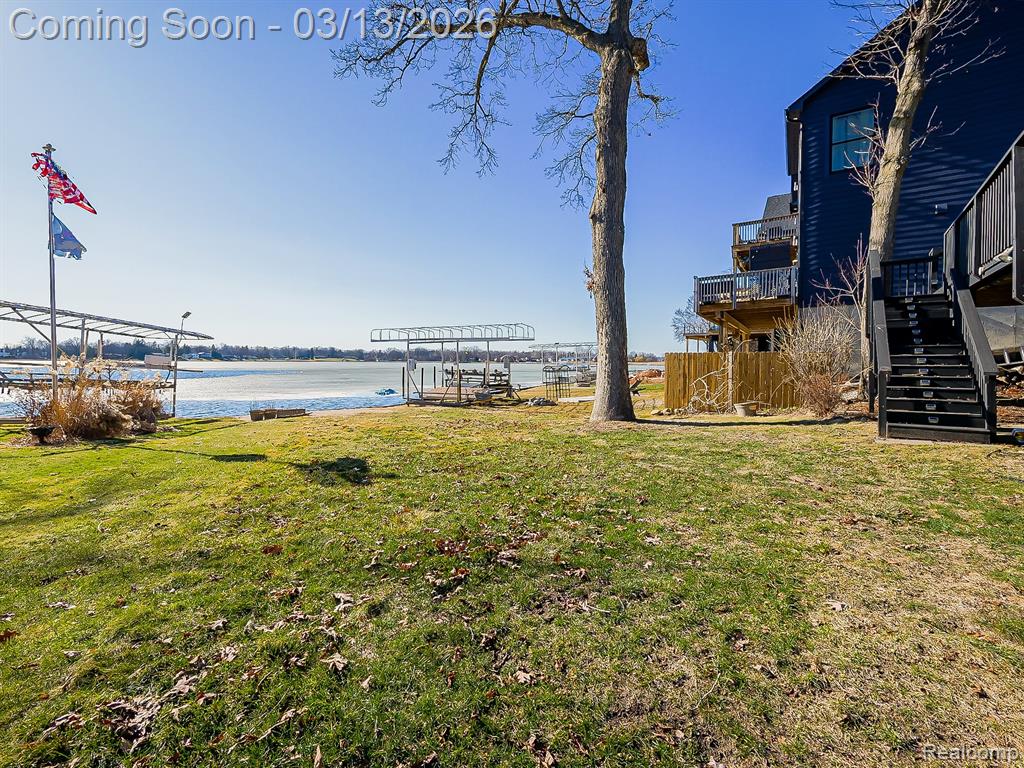 Water view featuring an outdoor fire pit